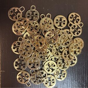 Tory Burch gold charms. 43 new gold charms.